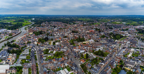 Aerial panorama view around the downtown of the city Wetteren in Belgium on a cloudy afternoon in summer