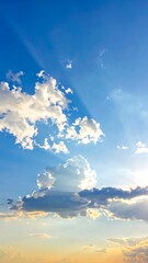 Clouds and sunlight in a vast sky