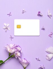 Blank white credit card surrounded by light purple flowers on a lavender background