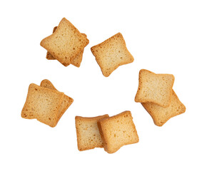 whole wheat mini toasts, toasted slices of bread or rusks isolated on white background, top view