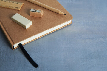 Minimalist stationery set with notebook pencil eraser and ruler
