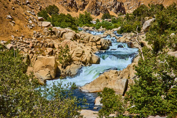 Kern River Whitewater Cascades Amid Rocky Terrain and Greenery in Sequoia National Forest