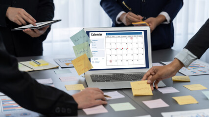 Analyst team use sticky note for creative and analytic brainstorm for business idea with BI data dashboard on laptop screen. Analysis financial data visualization tech for marketing strategy. Prodigy