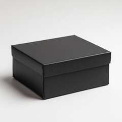 Naklejka premium Empty black cardboard gift box isolated on gray background