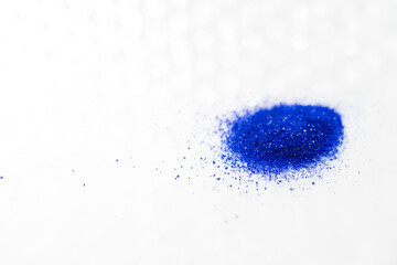 Close up of Blue Copper Peptides in Powder and Liquid Form