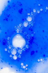 Close up of Blue Copper Peptides in Powder and Liquid Form