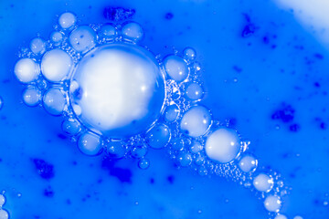 Close up of Blue Copper Peptides in Powder and Liquid Form