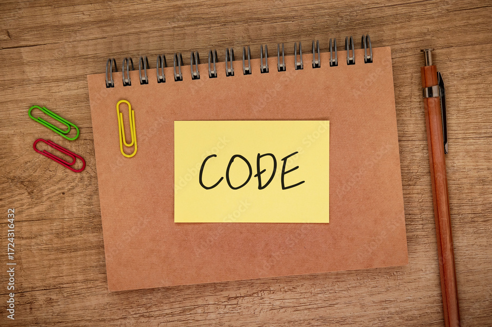 Poster there is sticky note with the word code. it is as an eye-catching image.