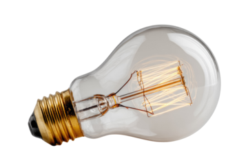 A transparent vintage Edison light bulb with a glowing filament, isolated on a transparent background. background removed