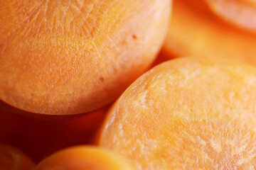 Close up shot of sliced carrot as background