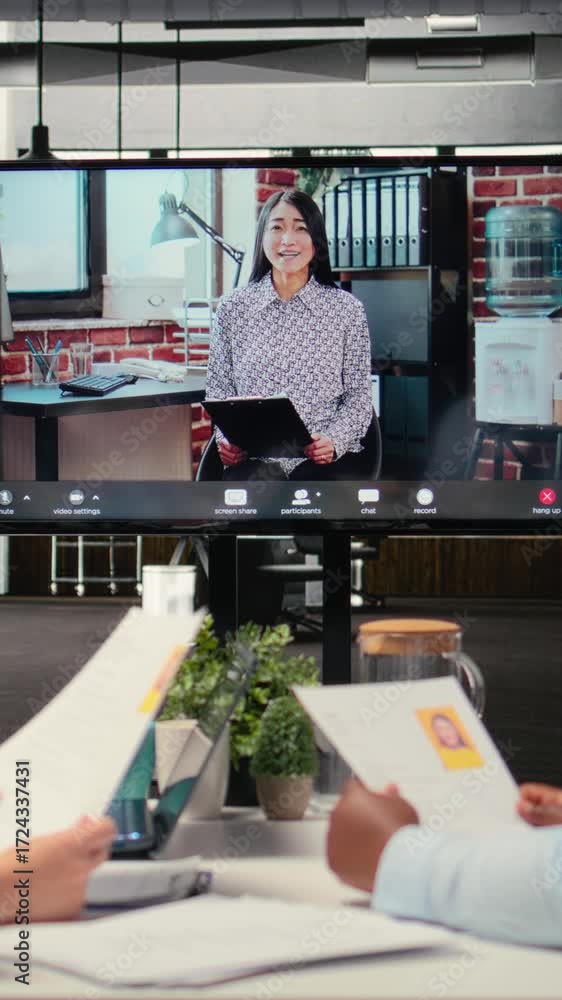 Poster vertical video recruitment process continues as a job seeker participates in an online interview, an
