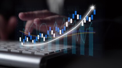 A business professional examines stock market trends using a keyboard, complemented by digital graphs showcasing upward growth, reflecting investment analytics. Copula - Powered by Adobe