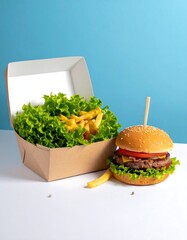 A burger and fries in takeout boxes against a teal background