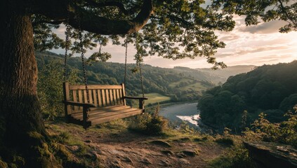 Wooden swing overlooking valley at sunset (1)