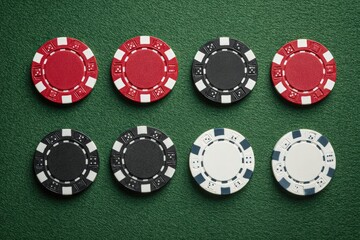 Poker chips arranged on a green felt table (1)