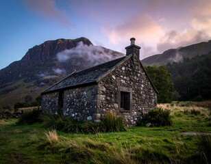 Rustic stone cottage nestled in a mountain valley at dawn