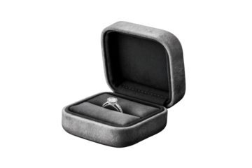 A diamond engagement ring rests inside a gray velvet ring box, a symbol of love and commitment. background removed