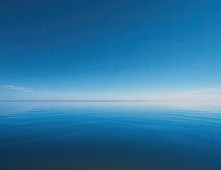 Obraz premium Tranquil expanse of a serene blue lake