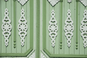 Wooden decoration elements, green wooden decorative surface.