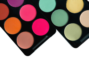 Set of eyeshadows palette, closeup isolated on white background.