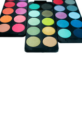 Set of eyeshadows palette, closeup isolated on white background.
