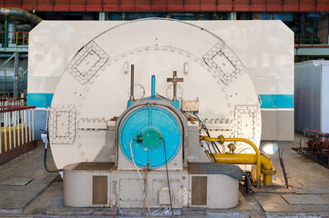 Powerful steam turbine generator set in thermal power plant machine hall operating efficiently in industrial environment