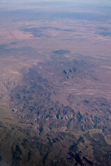 Aerial view of California Mountains,  view from  airplane window.