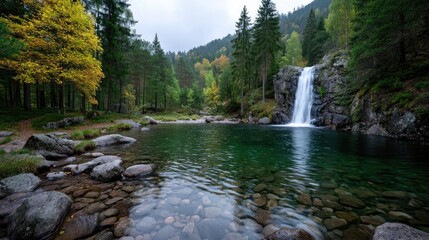 Autumn Forest Waterfall with Reflections in Calm Water and Rocks in Foreground in Hdr Cinematic Lighting