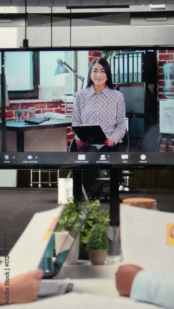 Poster Vertical Video Diverse HR staff hosting a virtual meeting to interview a candidate via web video conference, discussing the job application and professional background of the person for a potential