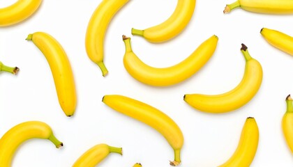 Top view, flat lay of multiple ripe yellow bananas scattered in a chaotic yet pleasing pattern on an isolated white background