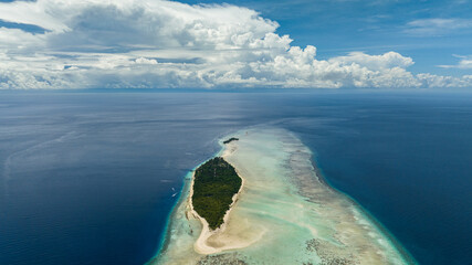 Top view of island Mataking with coral reef and atoll. Tun Sakaran Marine Park. Borneo, Sabah, Malaysia.