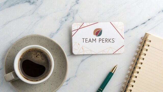 Elegant coffee cup, stylish notebook, and reward card on marble surface showcasing productivity and team spirit in work environment - Powered by Adobe