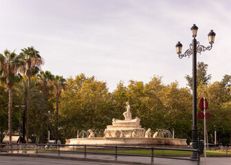 Obraz premium Fuente De Hispalis (Hispalis fountain) and urban park in Seville, Spain