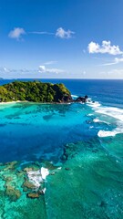 Coastal paradise, vibrant turquoise water, lush green hills, serene scene