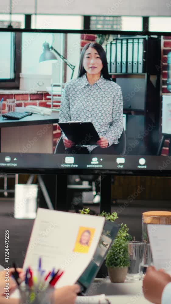 Poster vertical video recruiters and applicant engage in a virtual call conversation using webcam and high 