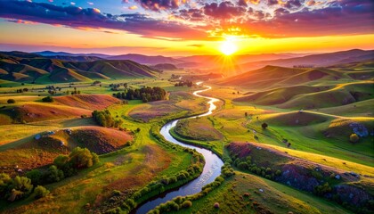 Fiery Sunset Over a Serpentine River Winding Through Lush, Rolling Hills