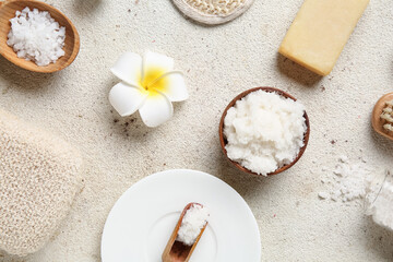 Composition with natural body scrub and bath supplies on light background