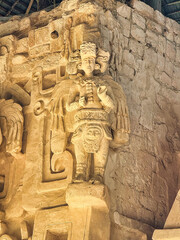 Close up of a Mayan winged warrior with unique jewellery outside the chamber of the Tomb of Ukit Kan Lek tok, on the acropolis pyramid of Ek Balam,near Valladolid,Yucatan,Mexico