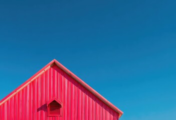 Red barn under vibrant sky