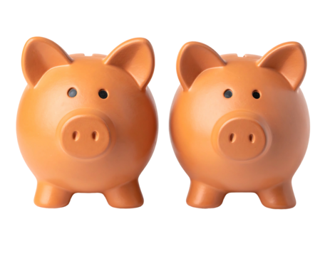 Two orange piggy banks, side-by-side, against a black background