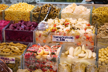 Colorful display of pickled veggies and fruits