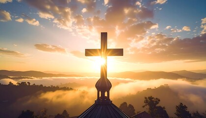 Sunrise over a church steeple with a cross