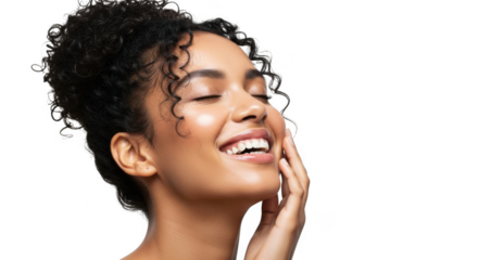 A joyful african woman with curly hair, smiling with her eyes closed and touching her cheek isolated on transparent background