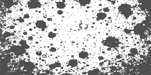 Black and white grunge background with ink splatters and paint stains