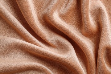 Soft, peach-toned fabric draped in folds