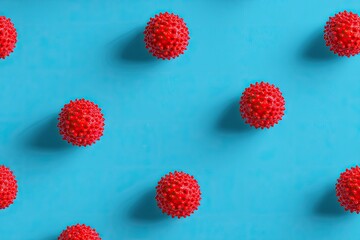 Red spheres on a bright blue background