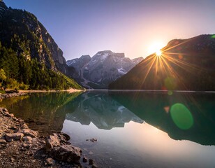 Sunrise over a serene mountain lake