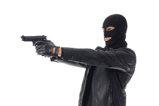 Male thief with gun on white background