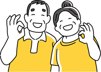 okポーズをとる高齢夫婦