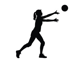 Silhouette of a female volleyball player serving the ball